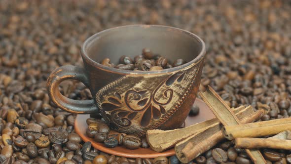 Coffee Beans Poured Into A Cup