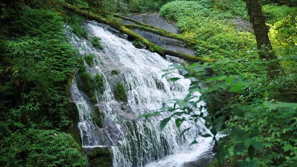 lan sa ded waterfall on kew mae pan nature trail which is a tropical rainforest alt