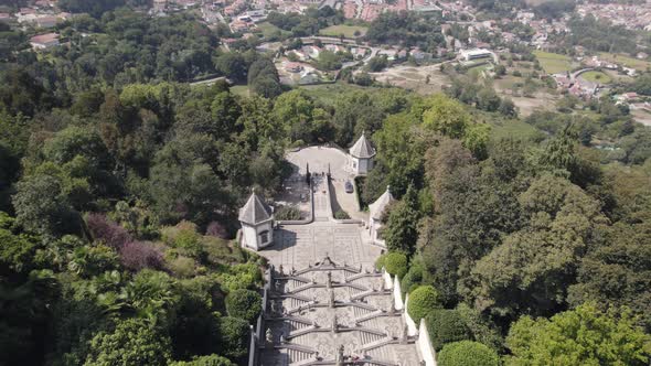 Stairway of Bom Jesus do Monte Sanctuary in Braga, Portugal. Aerial top down orbit alt