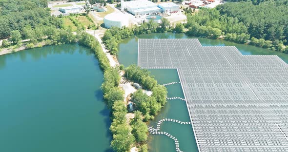 Aerial Top View of Renewable Energy Eco Technology Electric Power Industry Solar Panels on Floating alt