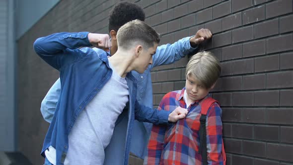 Aggressive Senior Students Bullying Junior, Mocking Weak Nerd, Intimidation alt
