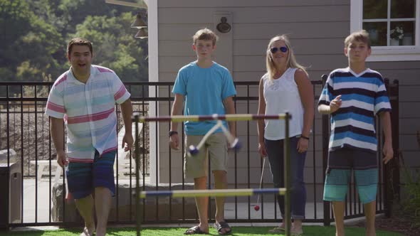 Group of people playing backyard games