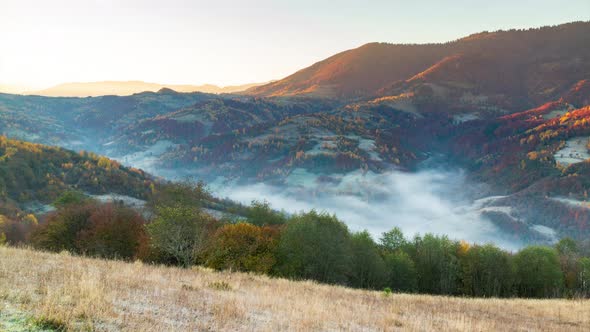 Epic Aerial Flight Over Sunrise in Autumn Mountains