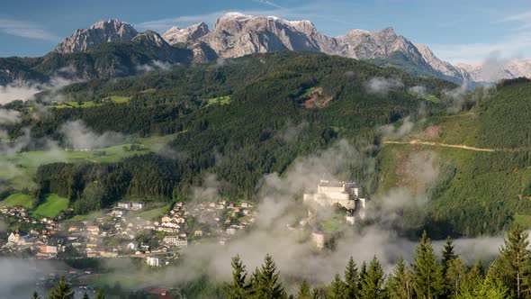 Hohenwerfen Castle in Austria. Foggy morning in Autumn Season alt