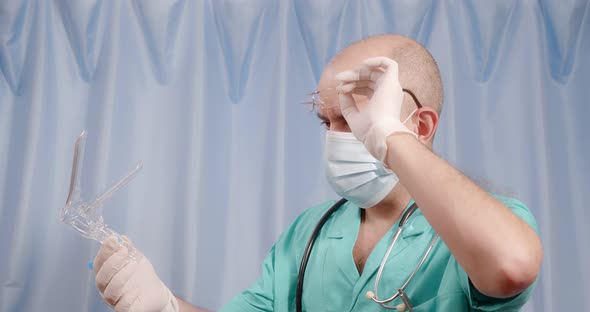 The Doctor Examines the Gynecological Device alt