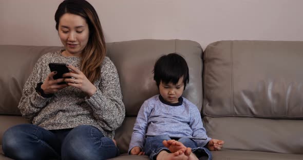Family enjoying time relaxing together at home alt