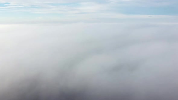 Aerial Drone View Flight Over Fog alt