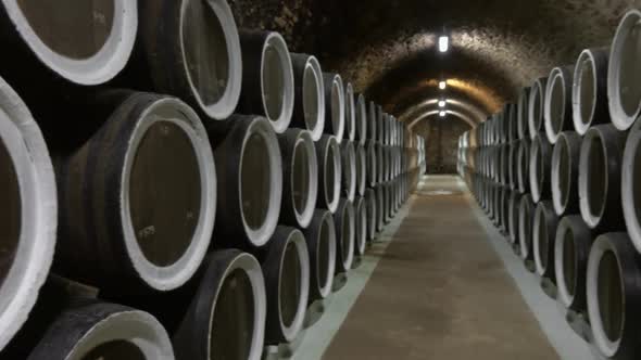 Barrel Filled with Wine in Wine Cellar alt
