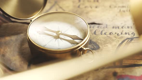 Treasure map with treasure spot marked by x sign seen through a magnifying glass alt