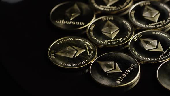 Rotating shot of Bitcoins (digital cryptocurrency) - BITCOIN ETHEREUM 114 alt