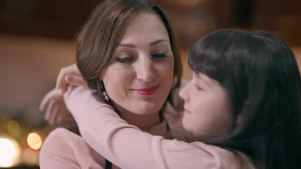 Closeup Portrait Laughing Happy Mother Hugging Little Daughter Indoors alt