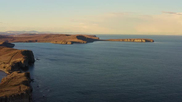 Rocky and Steep Cliffs Sunny Day alt