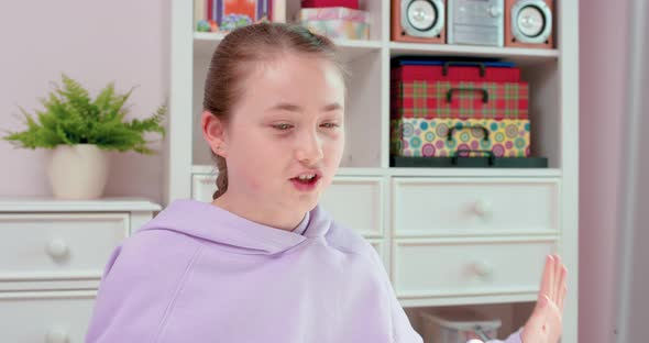 Teen Girl Says Goodbye and Wave Hand Chatting Online alt