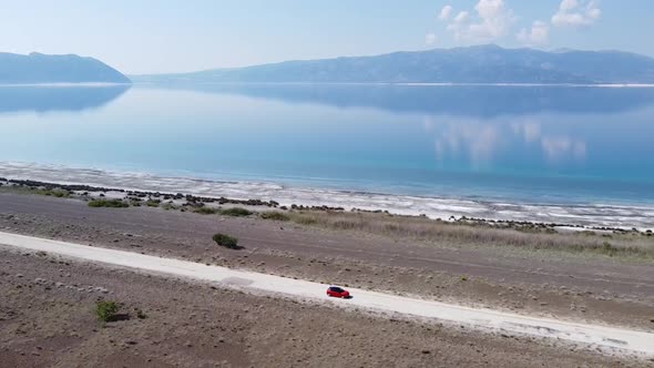 The Car Goes Along The Lake