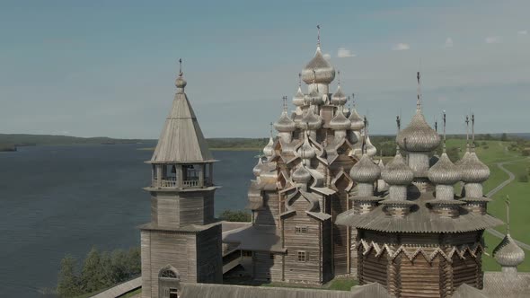 a Cinematic Shot From the Air Around the Wooden Walkway of Kizhi alt