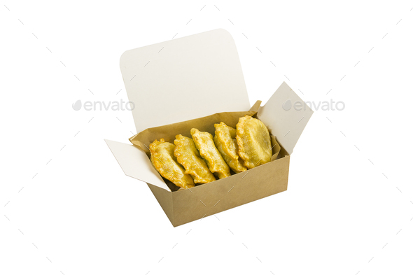 Fried dumplings in a takeout box - Stock Photo - Images