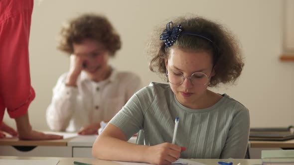 The Teacher in the Class Scolds the Naughty Children. Be Quiet. Back To School After Quarantine alt