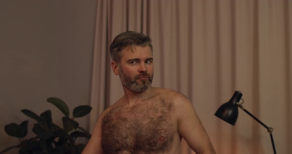 Close Up View of Mature Guy Drinking Elite Alcohol Singing and Funny Moving in Rhytm at Home alt