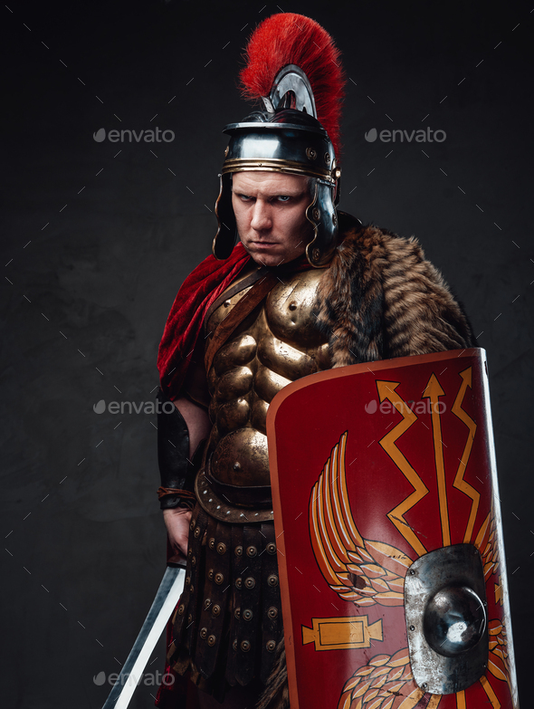 Ancient rome soldier with angry stare against dark background Stock ...