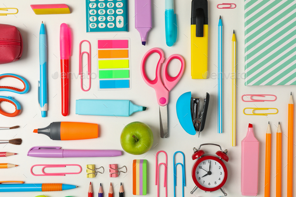 School equipment. Frame of school supplies on pink background. Flat lay.  Stock Photo