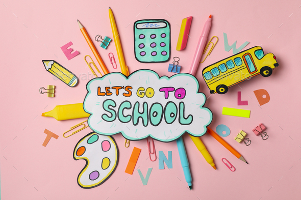 Text Let\'s go to school and school supplies on pink background