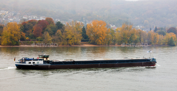 Loaded barge navigating river Rhine Germany - Stock Photo - Images