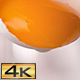 Separated Egg Yolk Falling out of Halved Shell - VideoHive Item for Sale