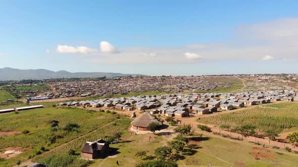 Morning in Suburban African Village, Dzaleka Refugee Camp, Aerial View alt