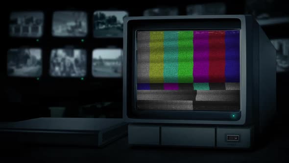 CCTV Monitor With Faulty Signal In Room Of Screens alt