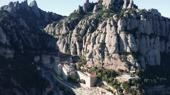 Panorama of famous mountain range of Spain: popular historical sightseeing in gorge at sunny day