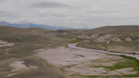River and sand dune landscape in Altai also called as Moon valley