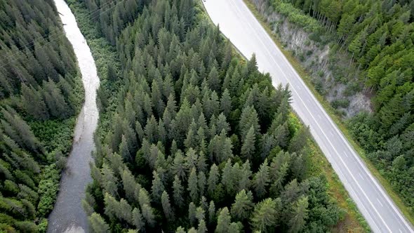 Aerial View of pine tree, Cars and Road on Alaska Kenai Penninsula alt