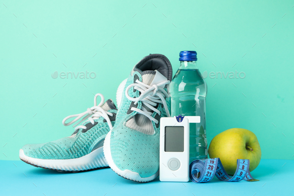 Concept of a healthy diabetic on mint background. Sports diabetic - Stock Photo - Images