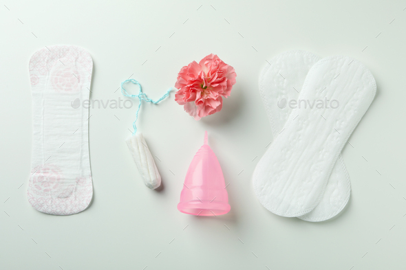 Concept of menstruation on white background, top view - Stock Photo - Images