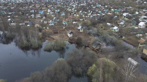Spring Flood Aerial View Flooded Garden Houses and Vegetable Gardens Below alt