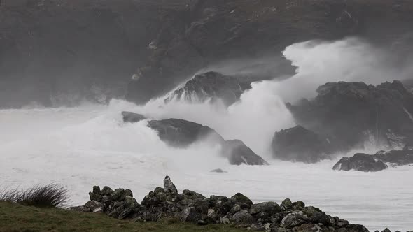 Huge Waves Crashing Into the Rocks of Glen Bay By Glencolumbkille in County Donegal  Ireland alt