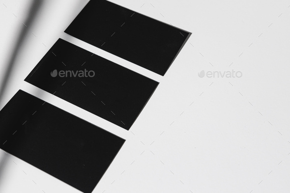 White blank business cards on dark black background Stock Photo by  FabrikaPhoto