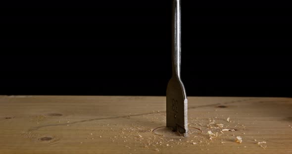 Wood Chip Turning on a Wood Board, Making Chips, Slow Motion 4K alt
