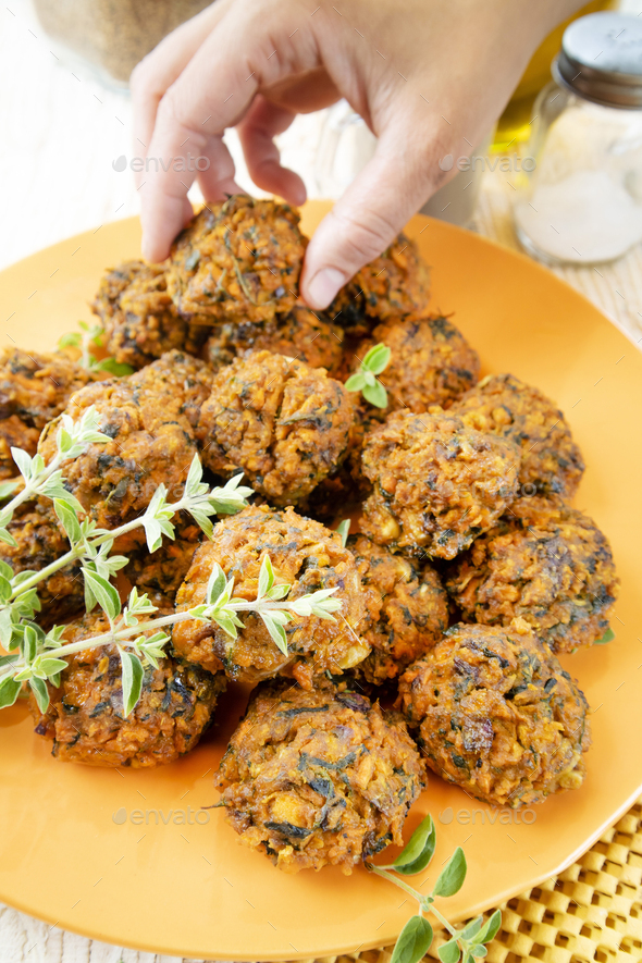 Falafel prepared with carrots and various spices - Stock Photo - Images
