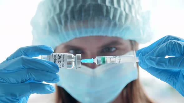 GP Wearing Medical Mask and Gloves in a Laboratory alt