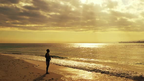 Catching fish for Happy boy on vacation has fun at beach on clean white sand and blue 4K background alt