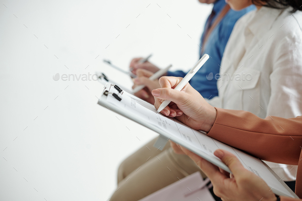 Applicants writing personal data in cv - Stock Photo - Images