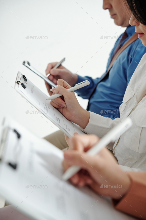 Candidates filling data in cv forms - Stock Photo - Images