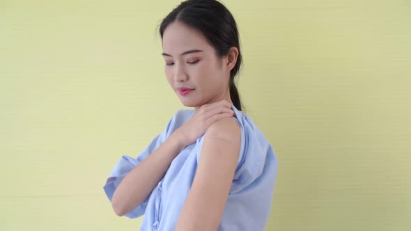 Young Asian Woman Showing COVID19 Vaccine Bandage Merrily alt