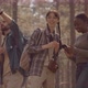 Multiethnic Friends Chatting on Walk in Forest - VideoHive Item for Sale