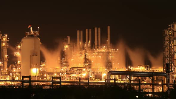 Time-lapse of Oil refinery industrial plant at night, Thailand