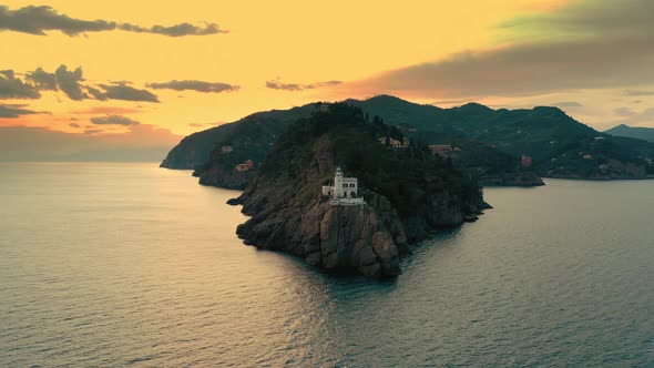 Lighthouse On Rock Above Sea alt