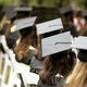 A group of students sit at a graduation ceremony, focus on mortarboard hat. - PhotoDune Item for Sale