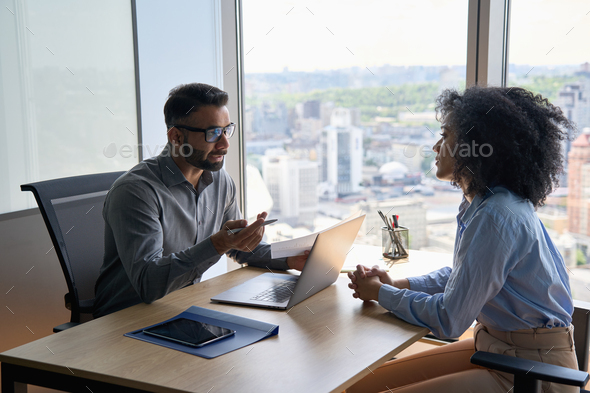 Indian latin hr manager on interview with African American applicant in office. - Stock Photo - Images