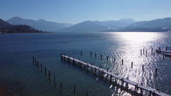 Aerial shot of a blue mountain lake in the alps. Lake Tegernsee in Bavaria, Germany.